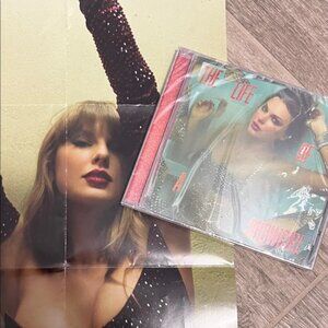The Life of a Showgirl CD— unopened, includes poster from other CD